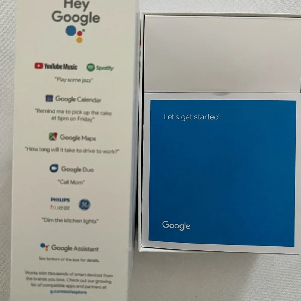 Google Assistant Device Packaging with Blue and White